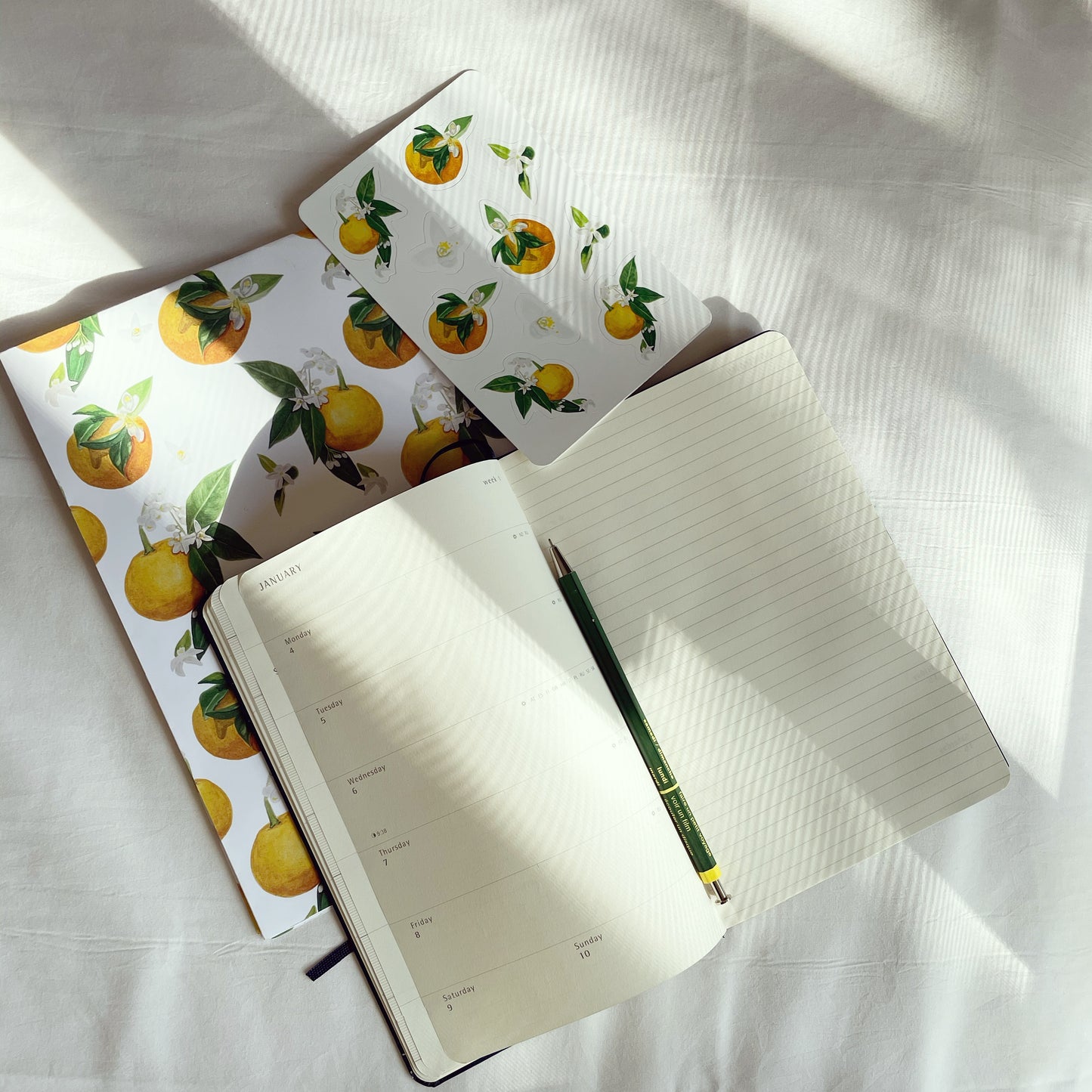 Wrapping paper sheets in Orange Blossom pattern are perfect for wrapping gifts or decorating your desk